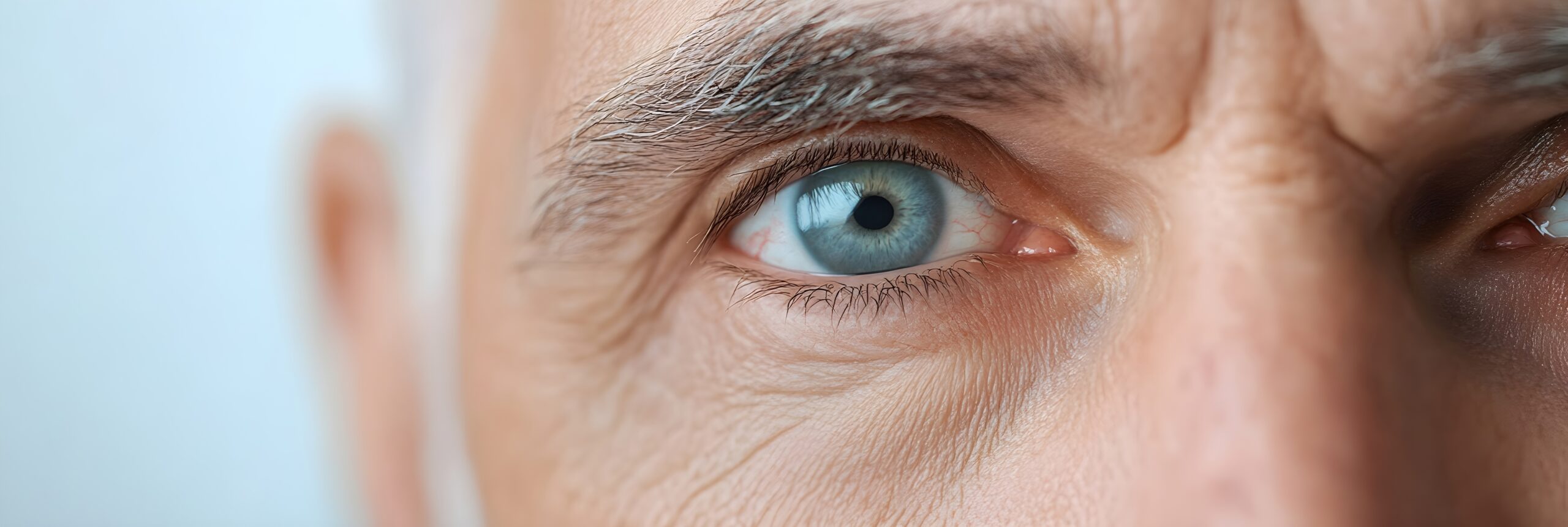 Female eye with long eyelashes close-up Closeup of male beautiful eyes. Good vision and eyes health. Vision testing, contact lens wearing and ophthalmology concept. Medical laser eye correction, vision correction, lasik treatment